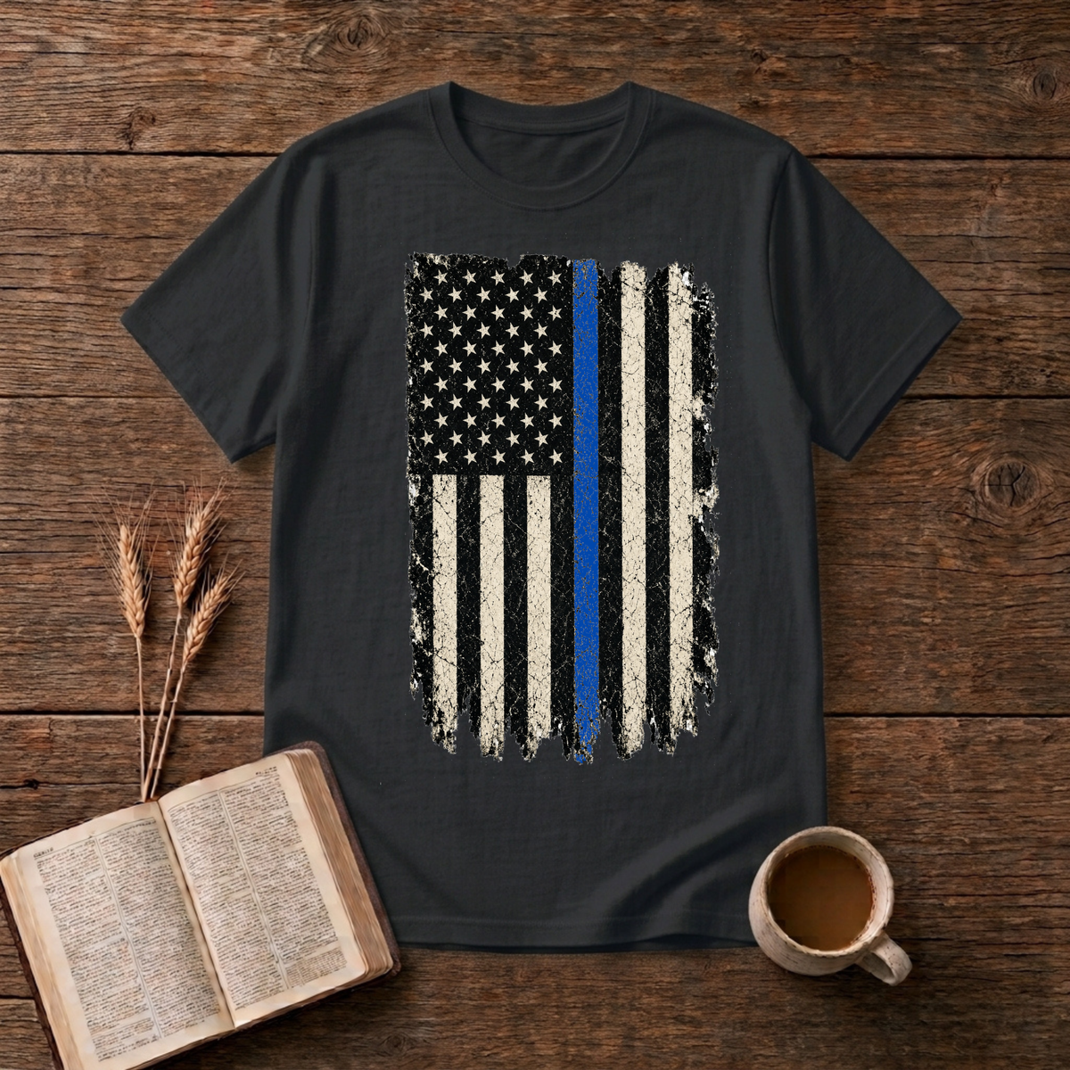 Distressed black and white American flag with a thin blue line on a Black unisex T-Shirt