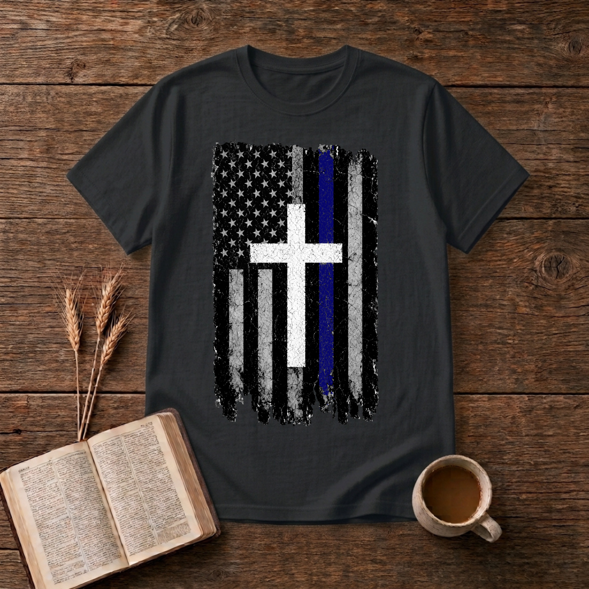 Faded black and white American flag with a thin blue line and cross on a Black unisex T-Shirt