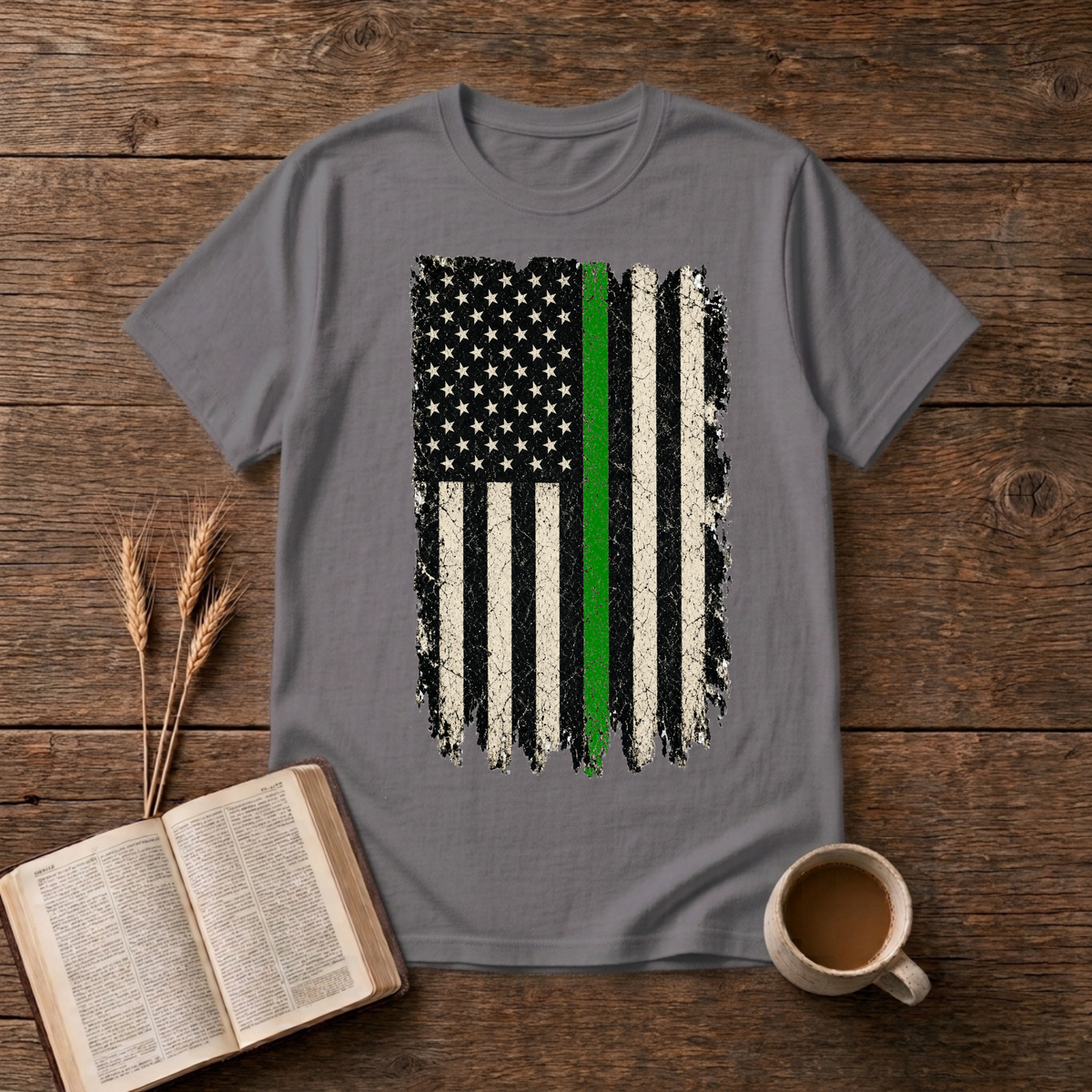 Distressed monochrome American flag with a thin green line on a Charcoal unisex T-Shirt