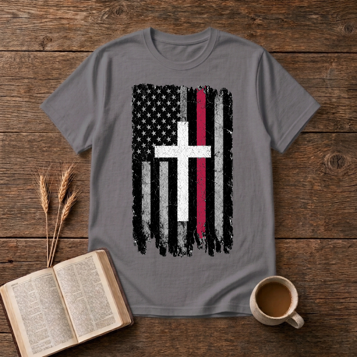 Grayscale American flag with a thin red stripe and cross motif on a Charcoal unisex T-Shirt