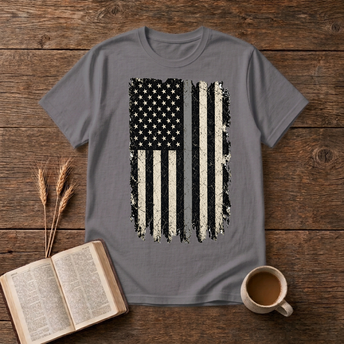 Distressed monochrome American flag with a thin gray line on a Charcoal unisex T-Shirt