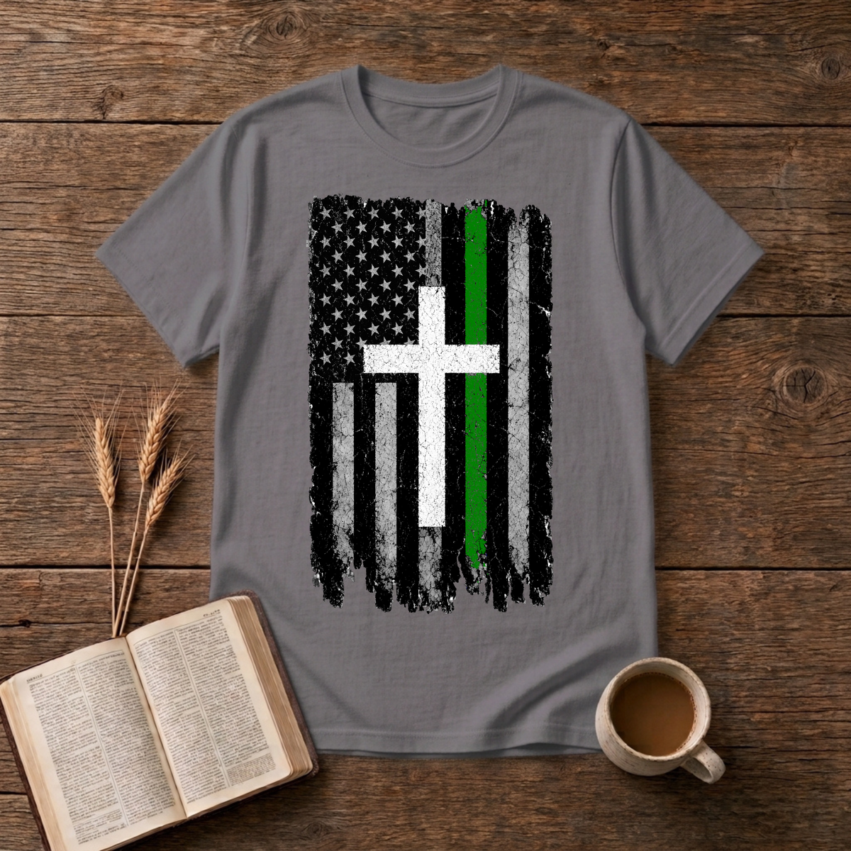 Distressed American flag fused with a cross and green line on a Charcoal unisex T-Shirt