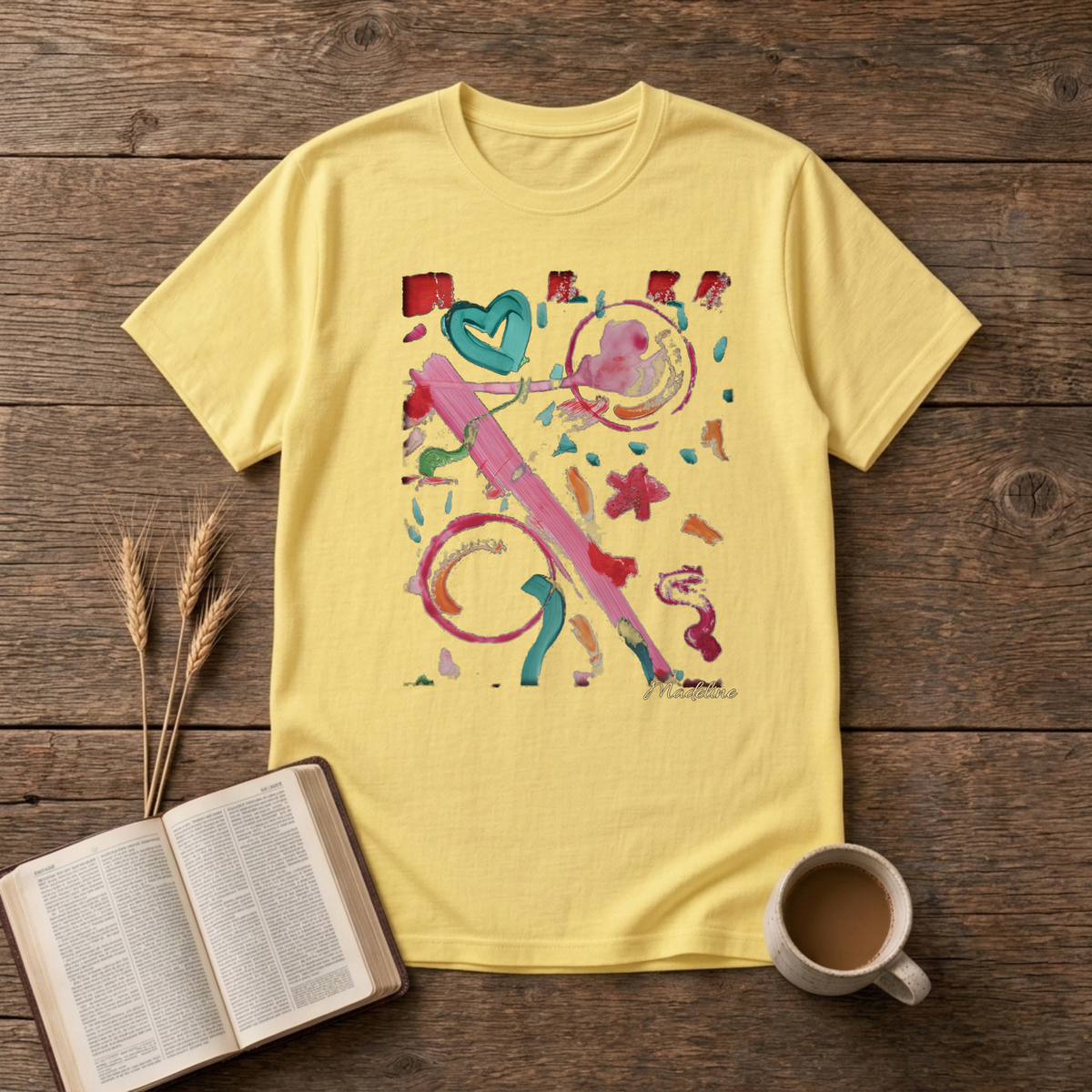 Watercolor swirls with a hand-drawn heart and confetti strokes on a Cornsilk unisex T-Shirt