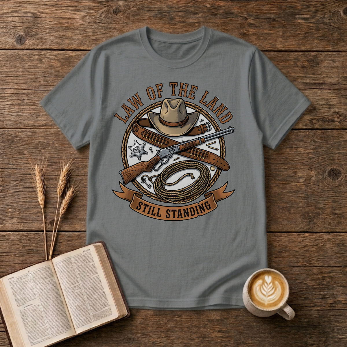 Western lawman emblem with cowboy hat, sheriff star, gun belt, lariat and rifle on a Graphite Heather unisex T-Shirt