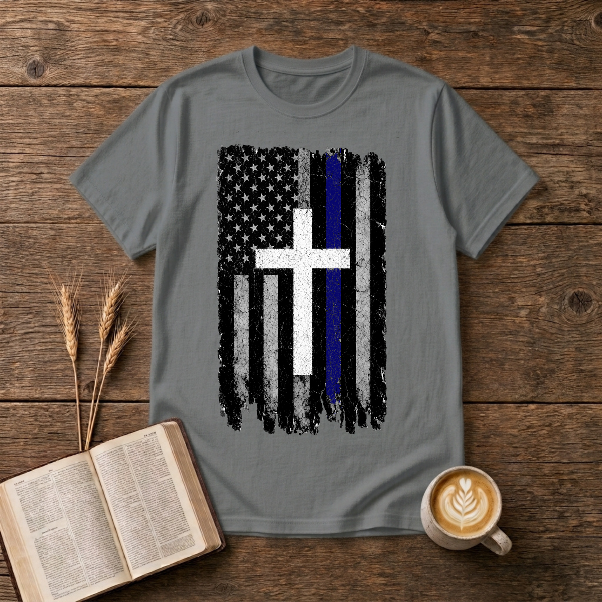 Faded black and white American flag with a thin blue line and cross on a Graphite Heather unisex T-Shirt