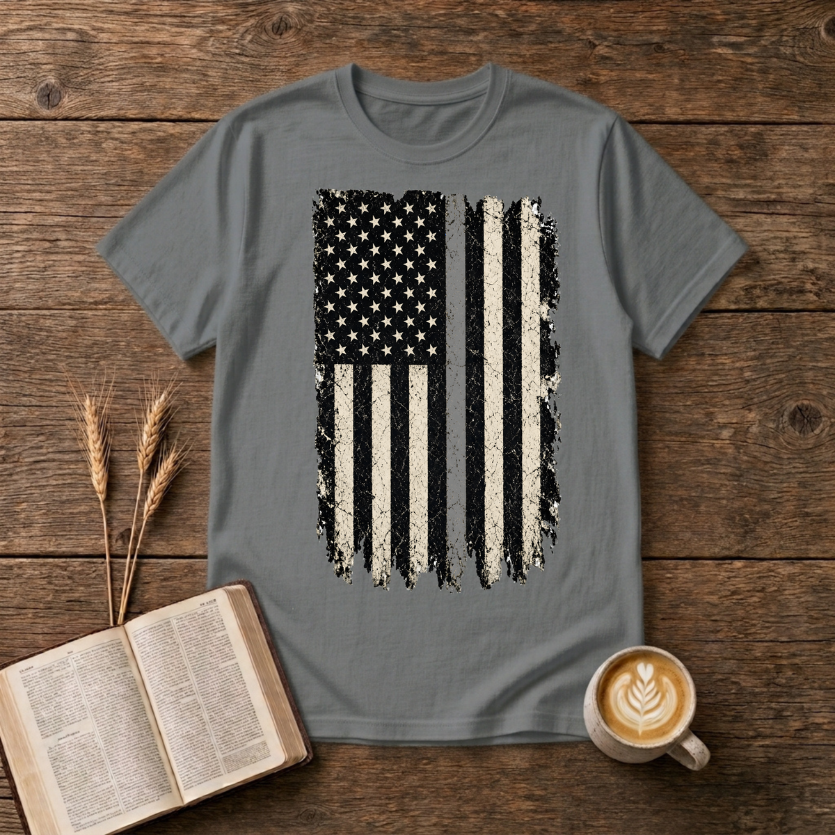 Distressed monochrome American flag with a thin gray line on a Graphite Heather unisex T-Shirt