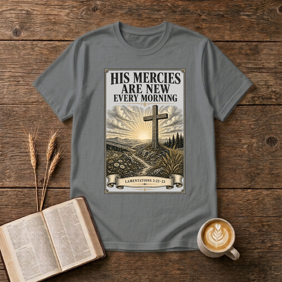 Simple cross with a sunrise halo and the words His mercies are new every morning on a Graphite Heather unisex T-Shirt