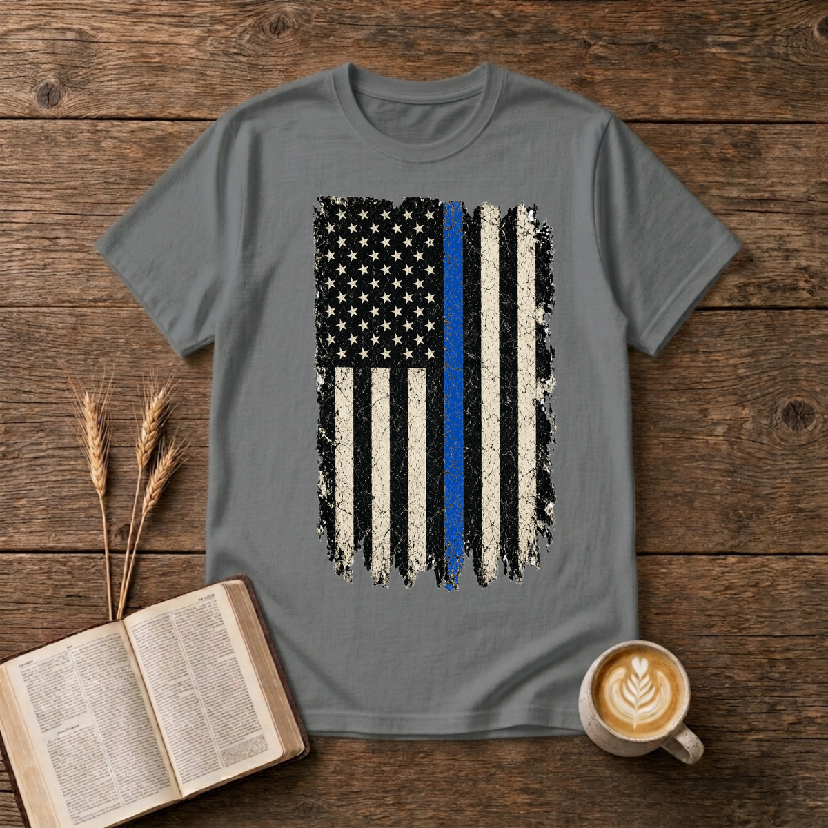 Distressed black and white American flag with a thin blue line on a Graphite Heather unisex T-Shirt