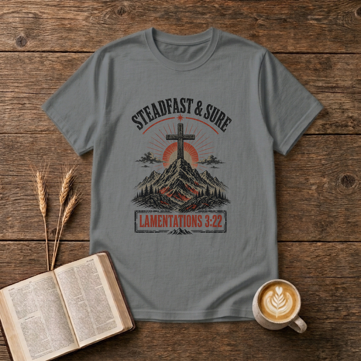 Faded cross with sunrise over mountains, Steadfast and Sure on a Graphite Heather unisex T-Shirt