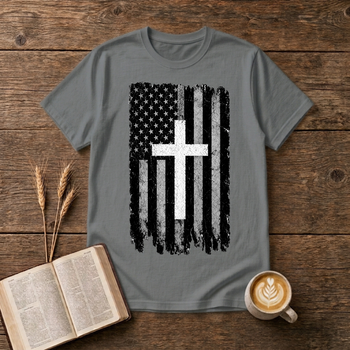 Distressed American flag with white cross on a Graphite Heather t-shirt