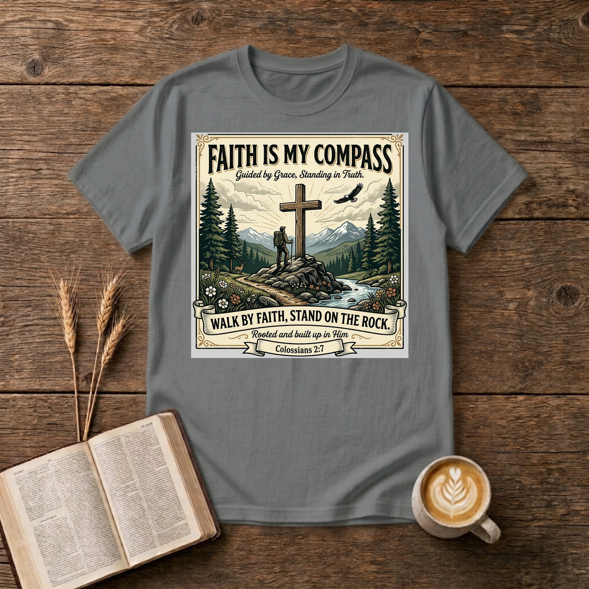 Faith Is My Compass design of a cross among pines with a lone hiker and soaring eagle on a Graphite Heather unisex T-Shirt