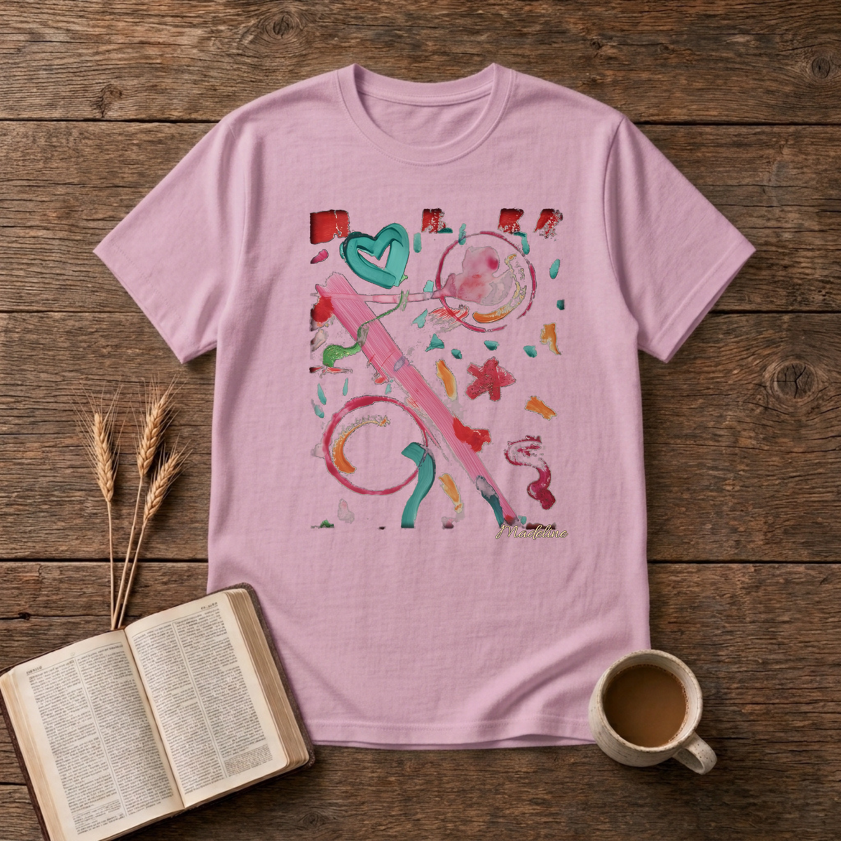Watercolor swirls with a hand-drawn heart and confetti strokes on a Light Pink unisex T-Shirt