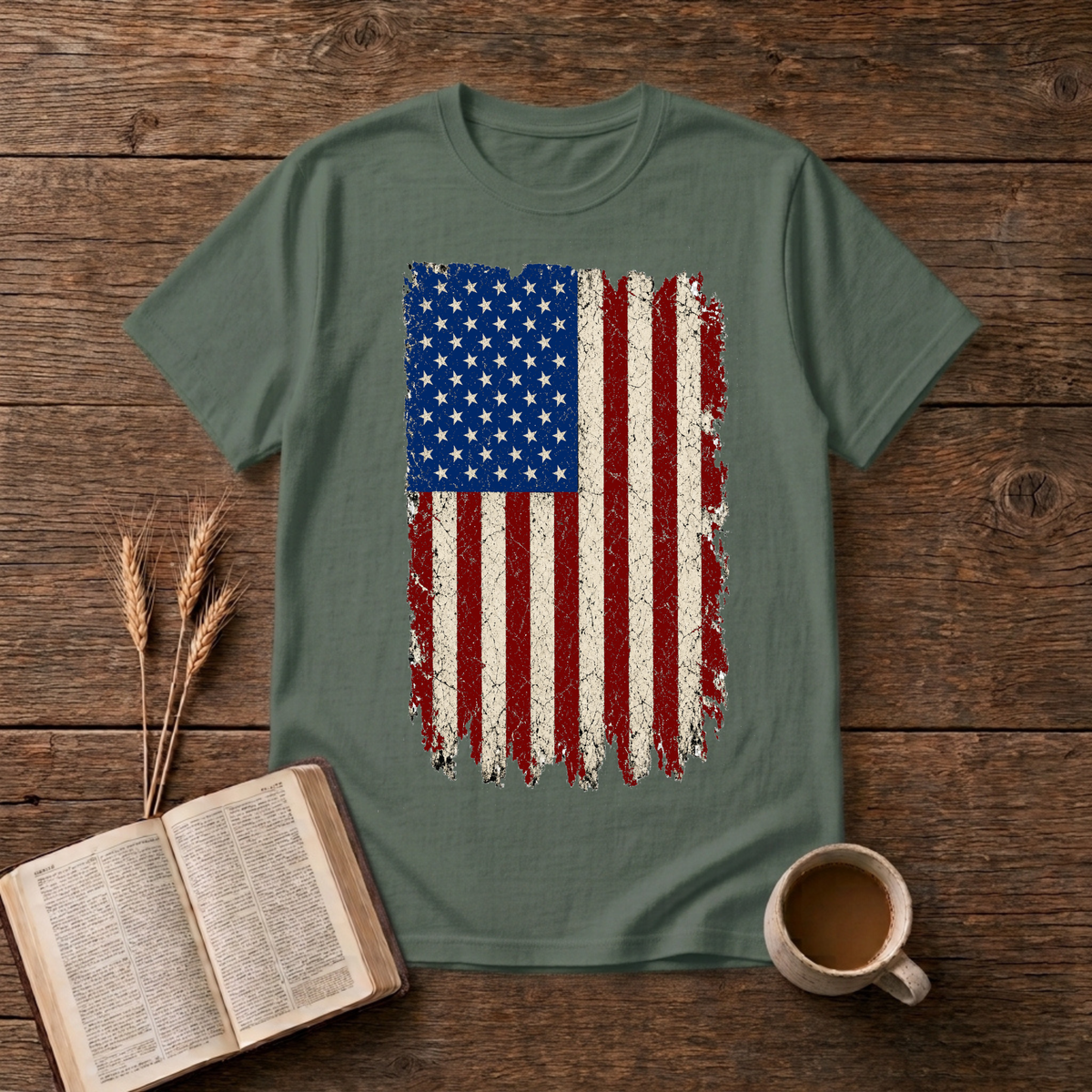 Distressed red, white and blue American flag with brushstroke edges on a Military Green unisex T-Shirt.