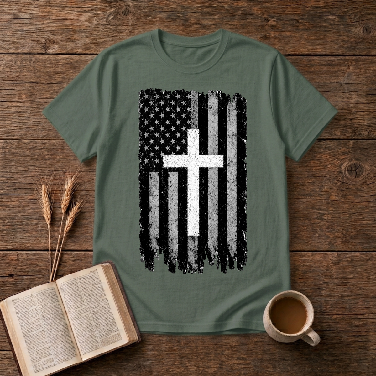 Distressed American flag with white cross on a Military Green t-shirt