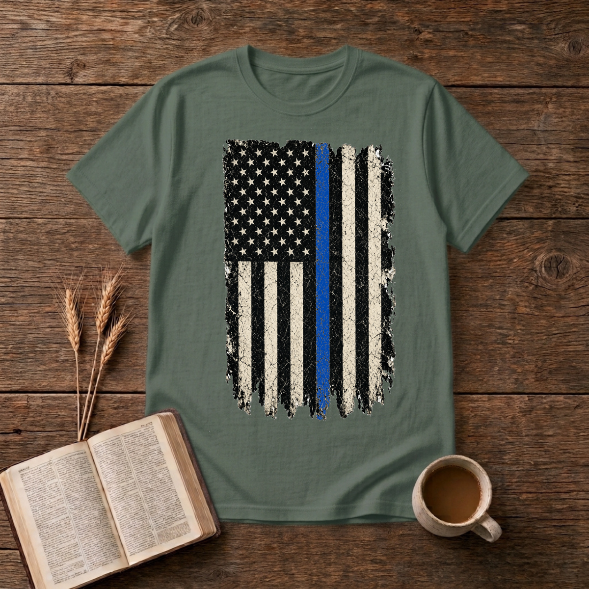 Distressed black and white American flag with a thin blue line on a Military Green unisex T-Shirt