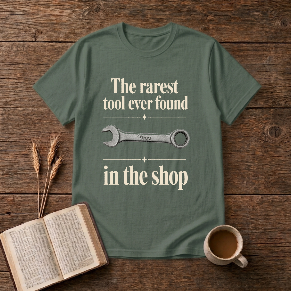 Vintage-style wrench graphic with understated text on a Military Green unisex T-Shirt