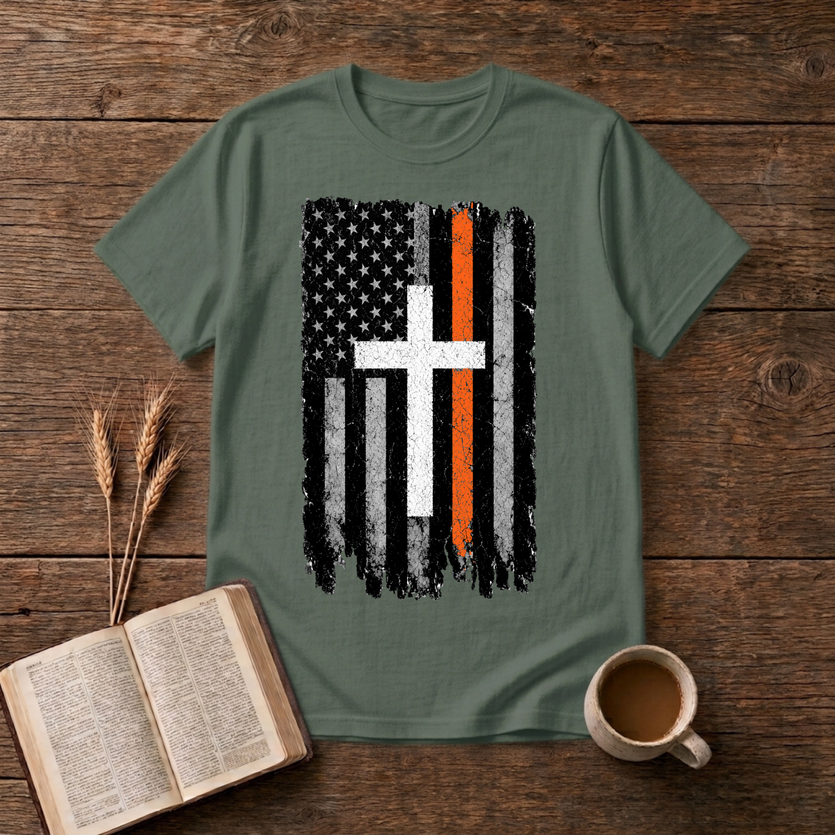 Distressed monochrome flag with a thin orange line and cross silhouette on a Military Green unisex T-Shirt