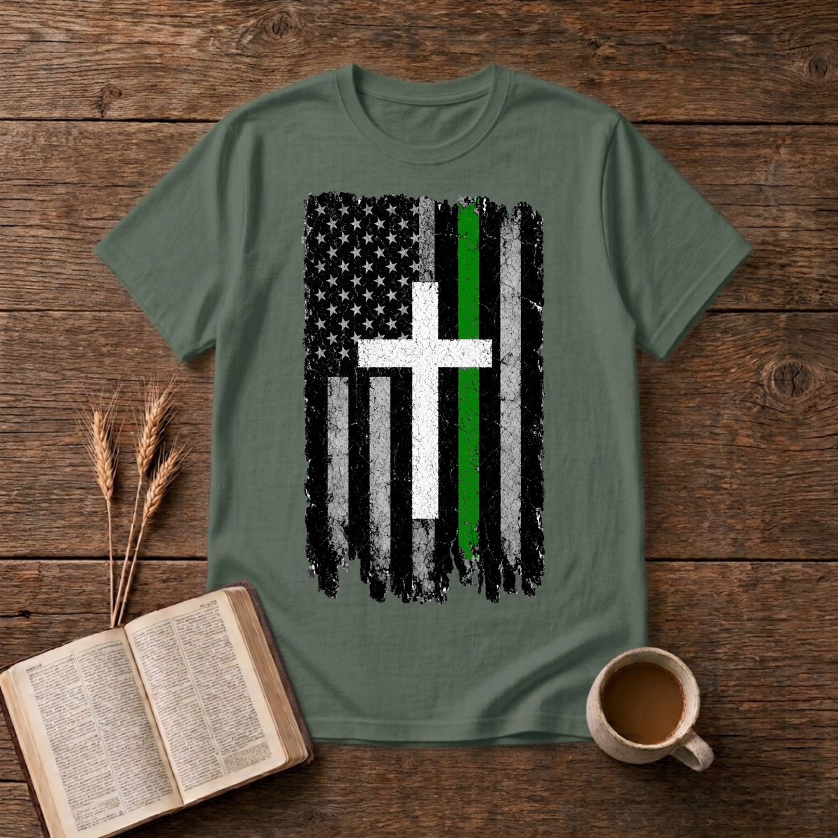 Distressed American flag fused with a cross and green line on a Military Green unisex T-Shirt