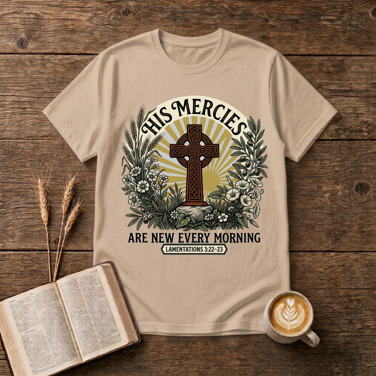 Celtic-style cross framed by florals and warm rays with His mercies are new every morning on a Natural unisex T-Shirt