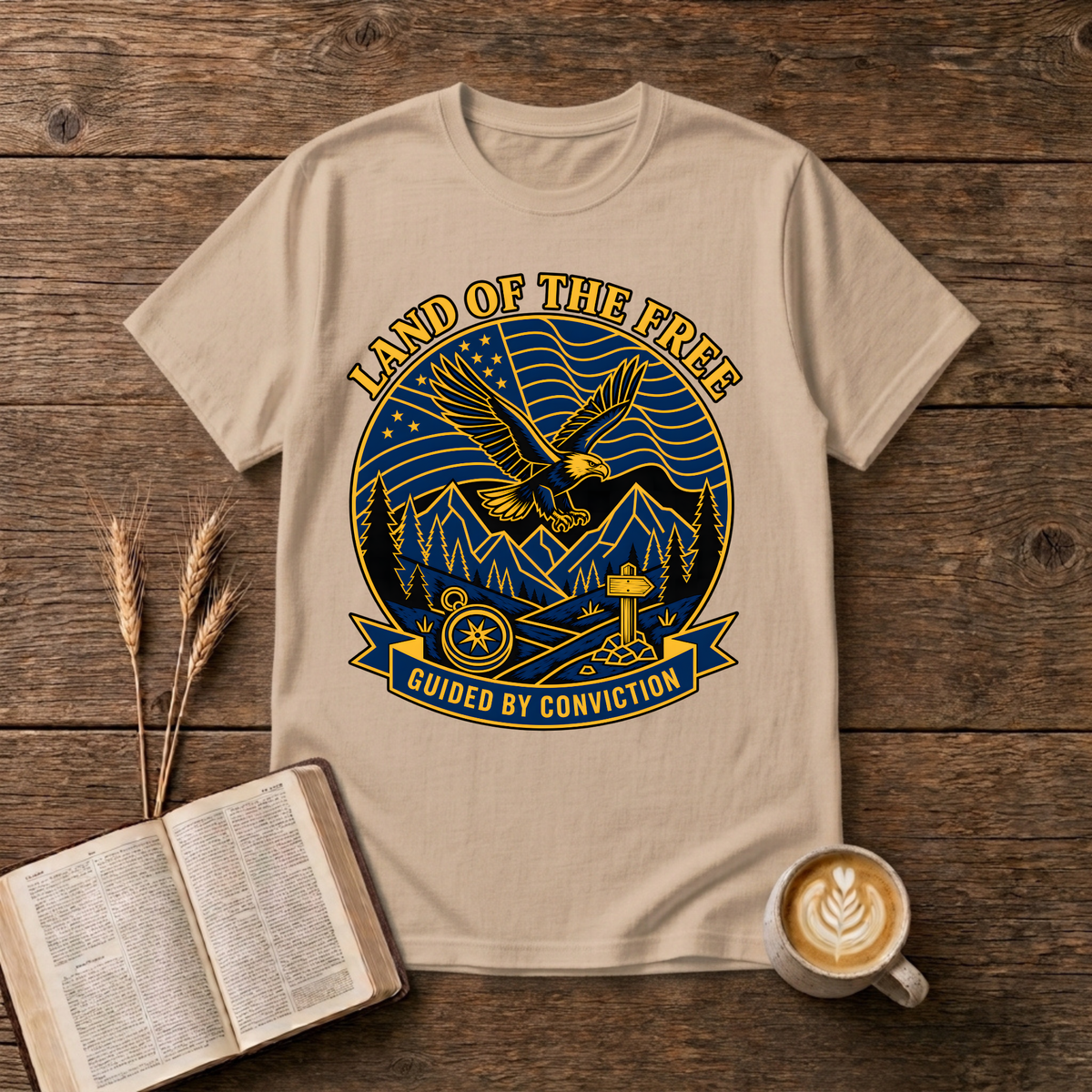 Bold monochrome emblem of an eagle in flight above mountains on a Natural unisex T-Shirt