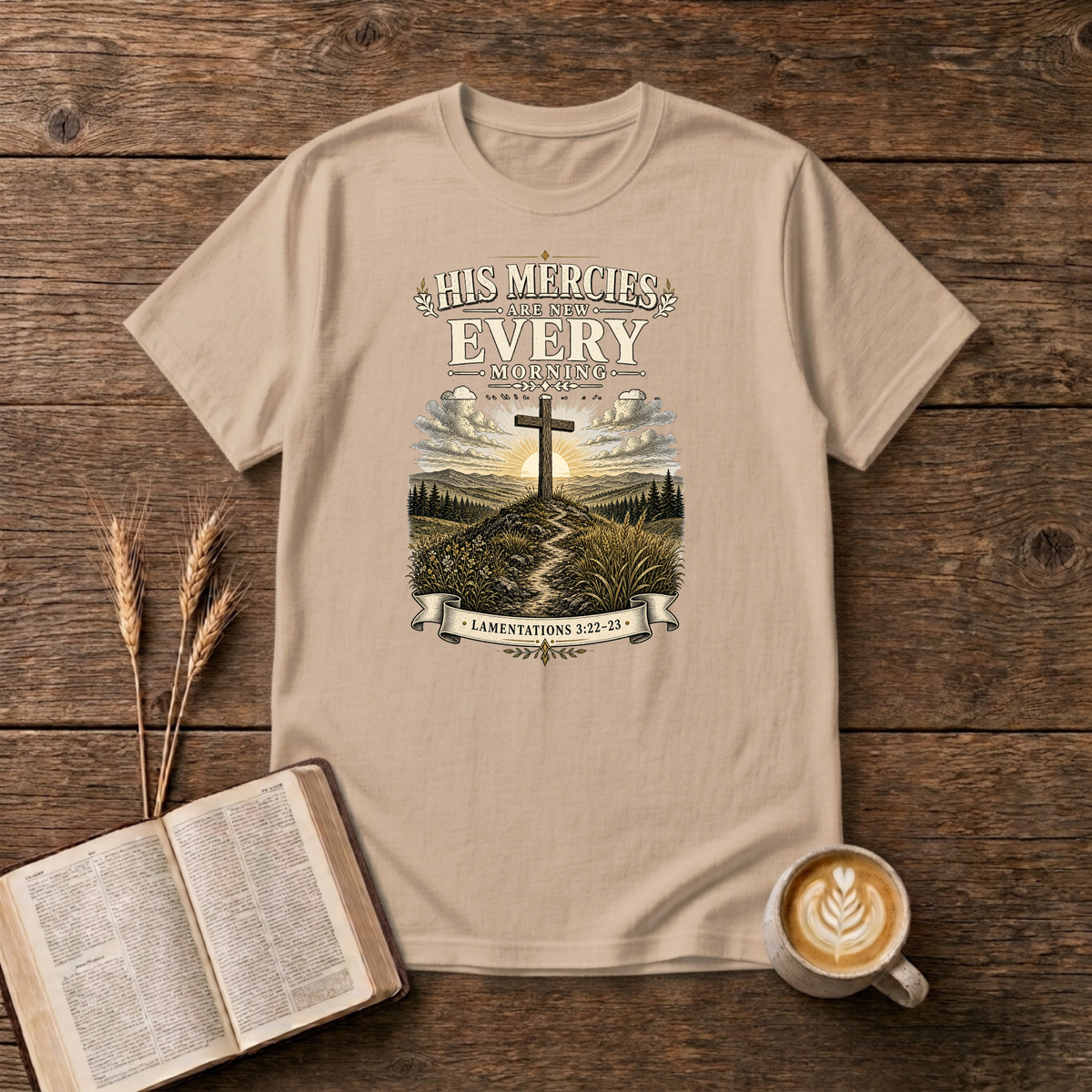 Muted sunrise behind a cross with His mercies are new every morning on a Natural unisex T-Shirt