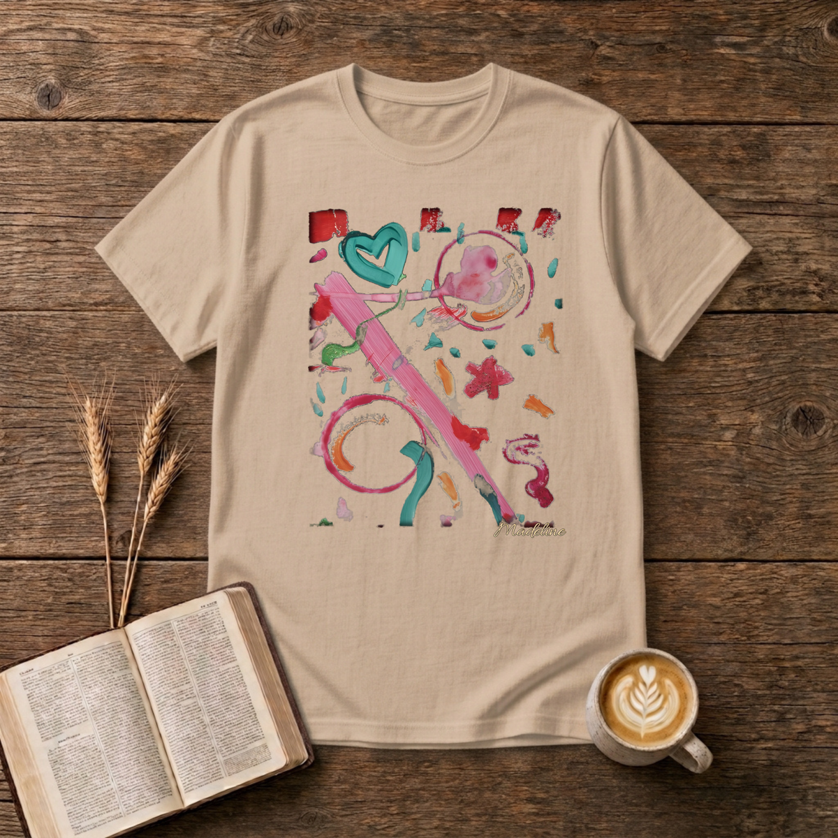 Watercolor swirls with a hand-drawn heart and confetti strokes on a Natural unisex T-Shirt