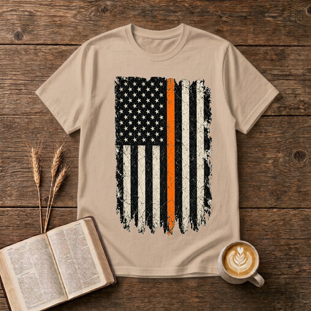 Distressed monochrome American flag with a thin orange line on a Natural unisex T-Shirt