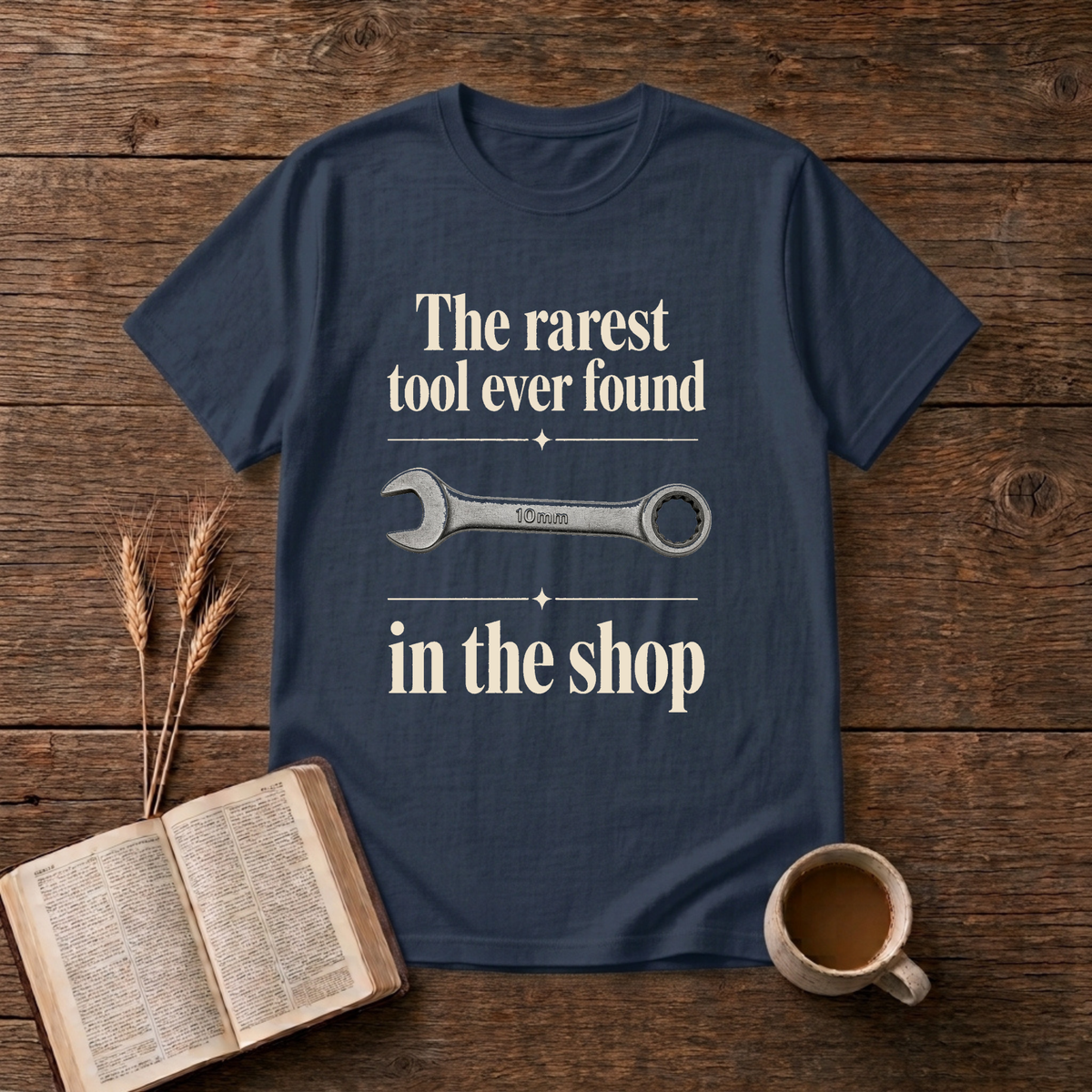 Vintage-style wrench graphic with understated text on a Navy unisex T-Shirt