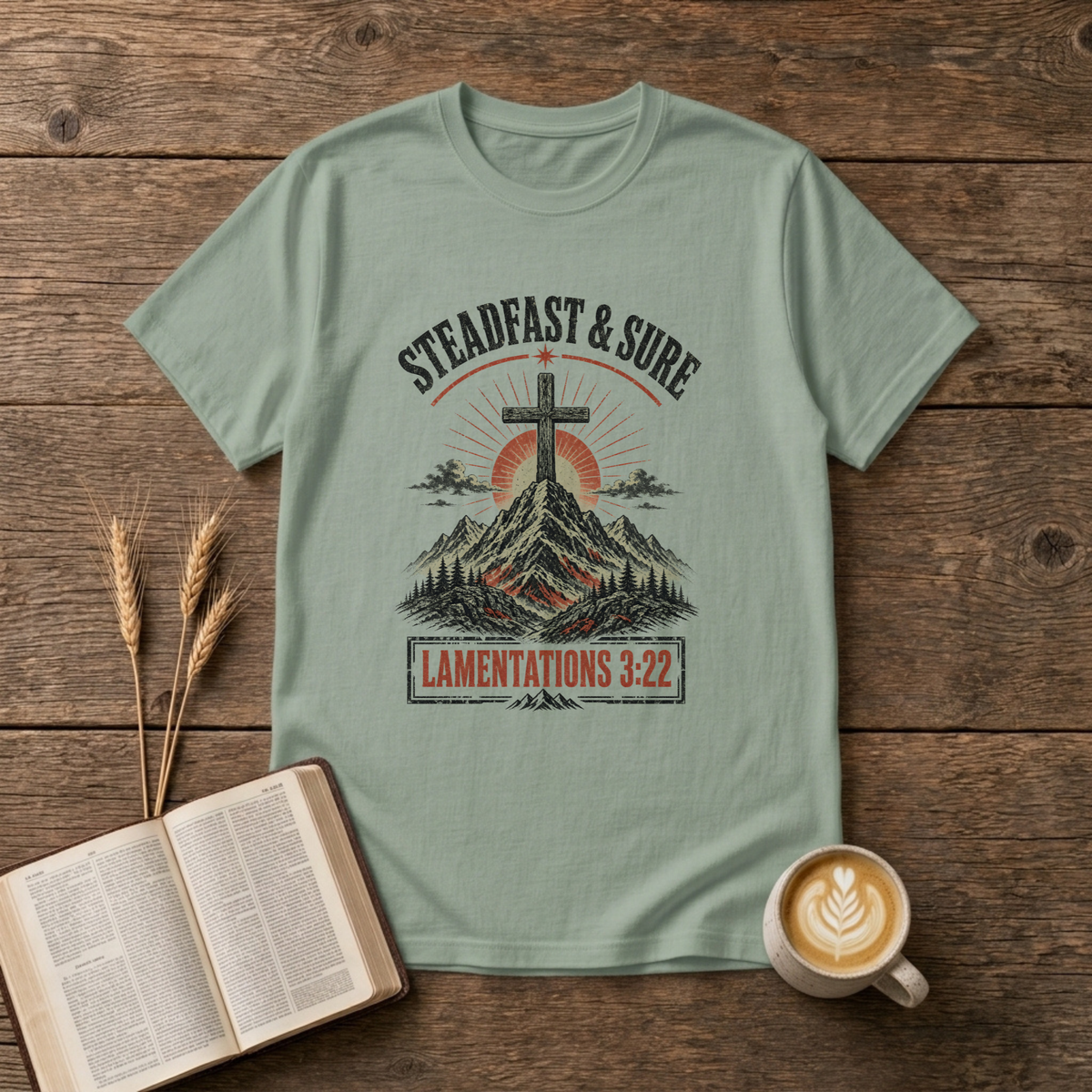 Faded cross with sunrise over mountains, Steadfast and Sure on a Sage unisex T-Shirt