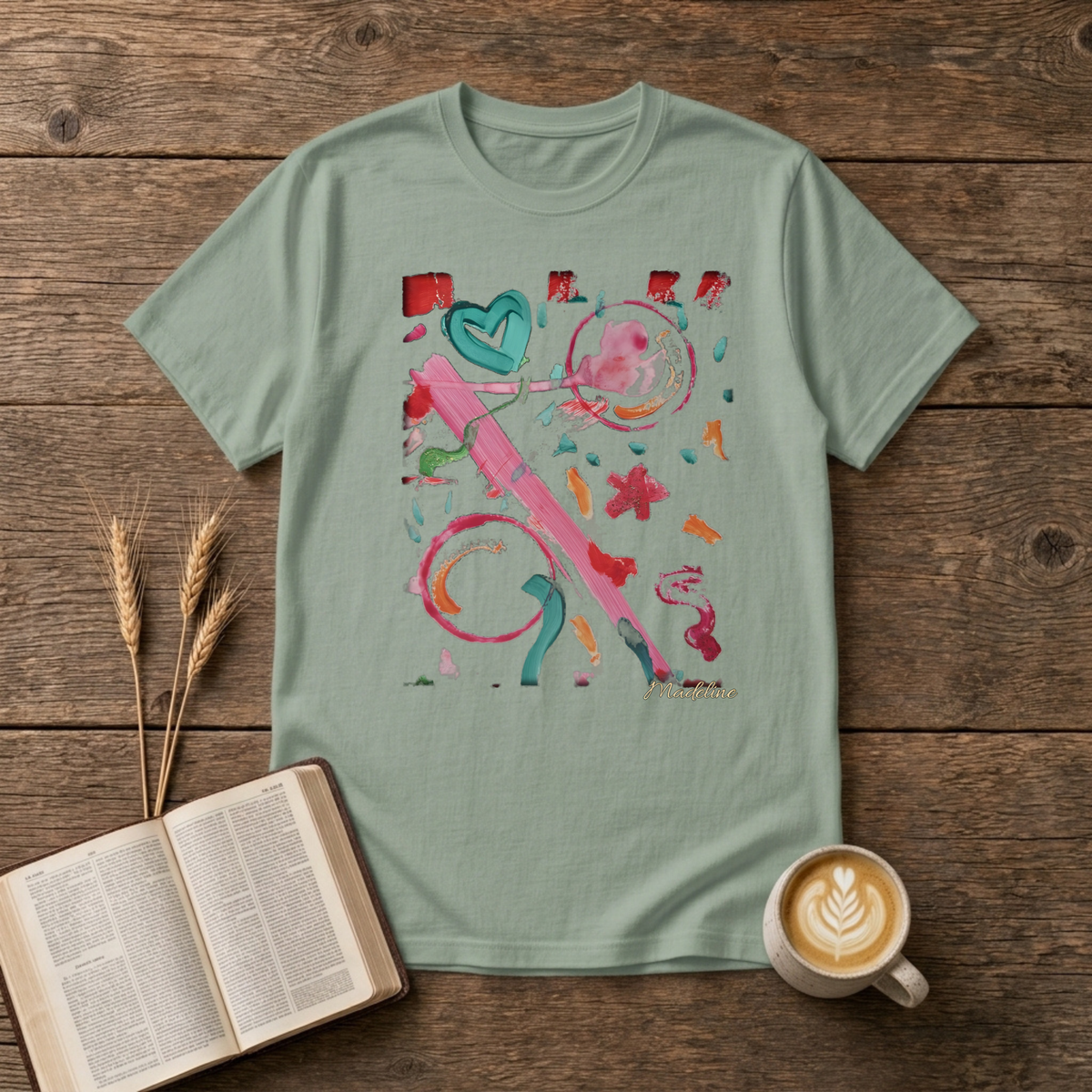Watercolor swirls with a hand-drawn heart and confetti strokes on a Sage unisex T-Shirt