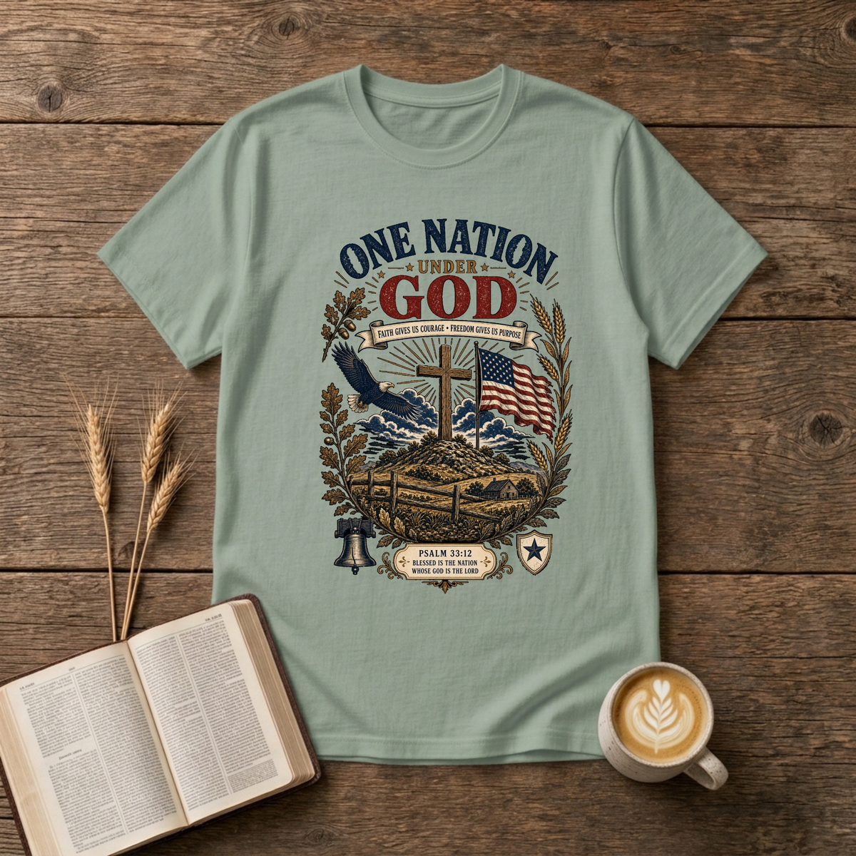 One Nation Under God design with a cross, waving flag, eagle and laurel sprigs on a Sage unisex T-Shirt