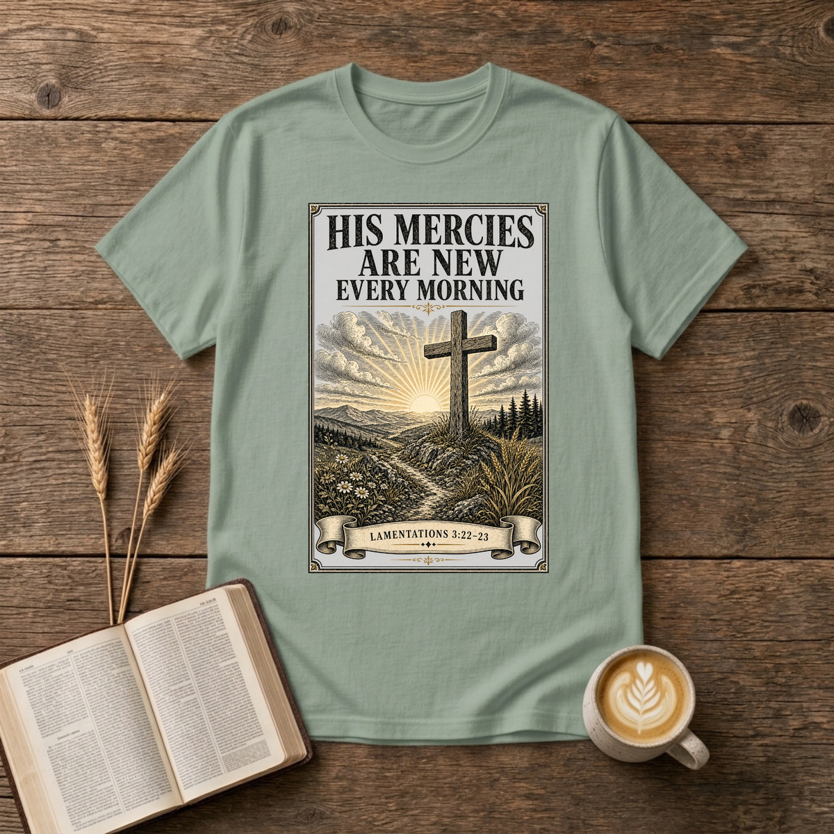 Simple cross with a sunrise halo and the words His mercies are new every morning on a Sage unisex T-Shirt