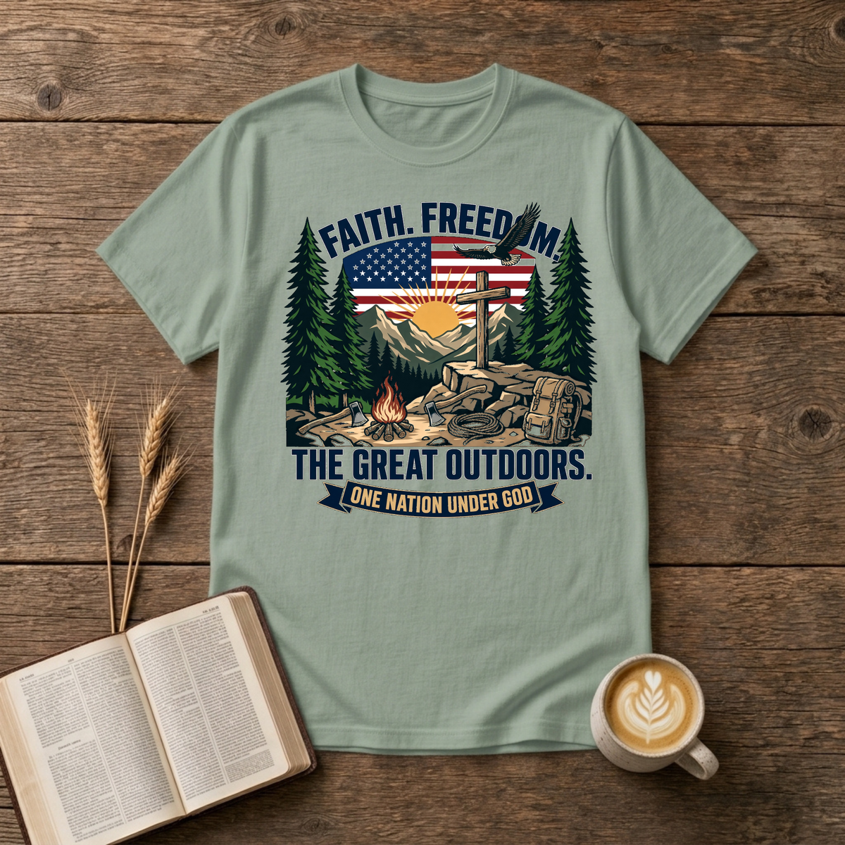 Cross on rock with bald eagle over the flag, mountain sunrise, pines and campfire on a Sage unisex T-Shirt