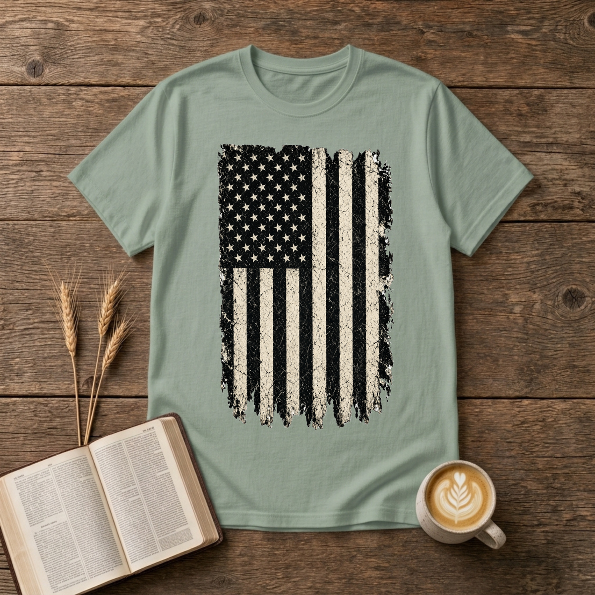 Distressed grayscale American flag with faded edges on a Sage unisex T-Shirt