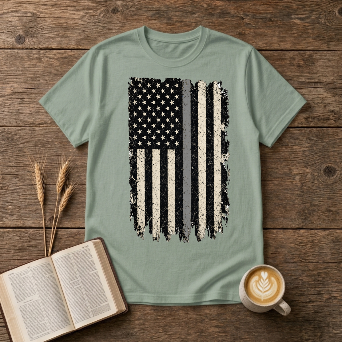 Distressed monochrome American flag with a thin gray line on a Sage unisex T-Shirt