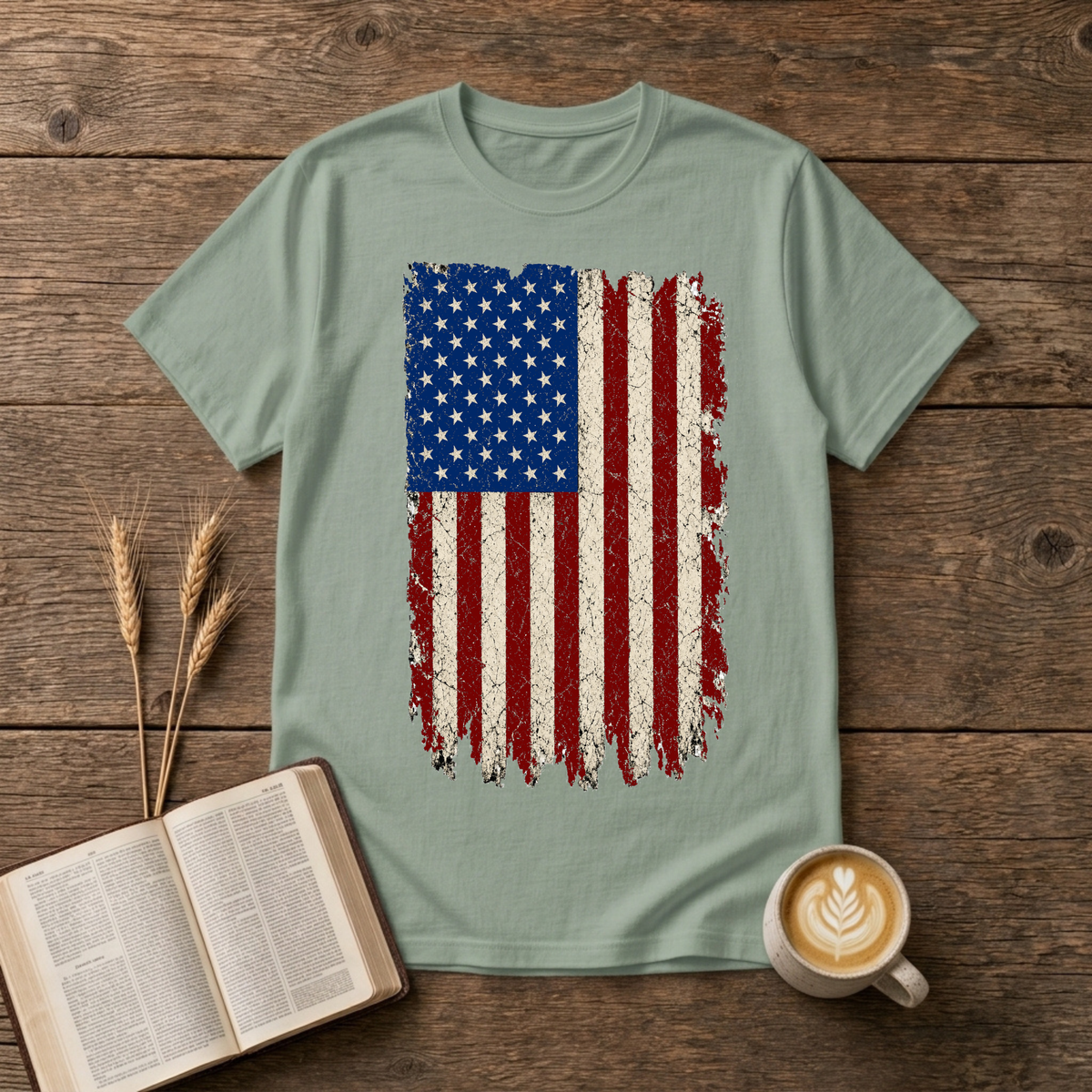 Distressed red, white and blue American flag with brushstroke edges on a Sage unisex T-Shirt.