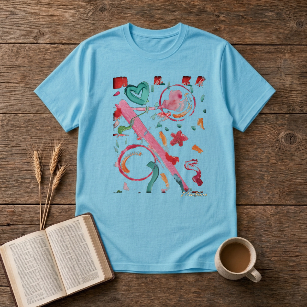Watercolor swirls with a hand-drawn heart and confetti strokes on a Sky unisex T-Shirt
