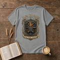 Forged With Purpose emblem of crossed hammers, an anvil and forge glow on a Sport Grey unisex T-Shirt