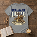 UNSHAKABLE HOPE lettering above a cross and lion illustration on a Sport Grey unisex T-Shirt
