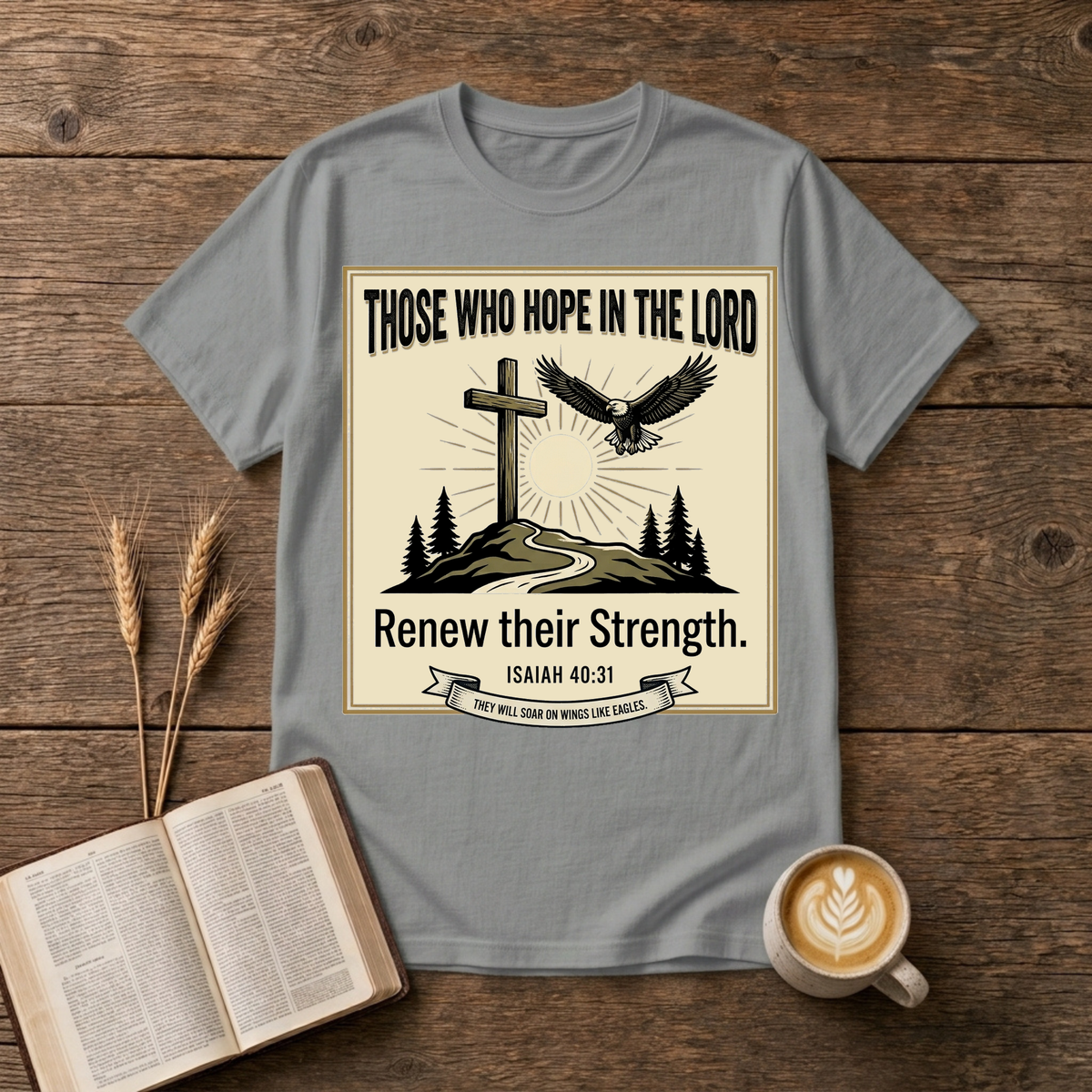 Hand-etched cross on a hill beneath a rising sun with an eagle overhead in a wreath frame on a Sport Grey unisex T-Shirt