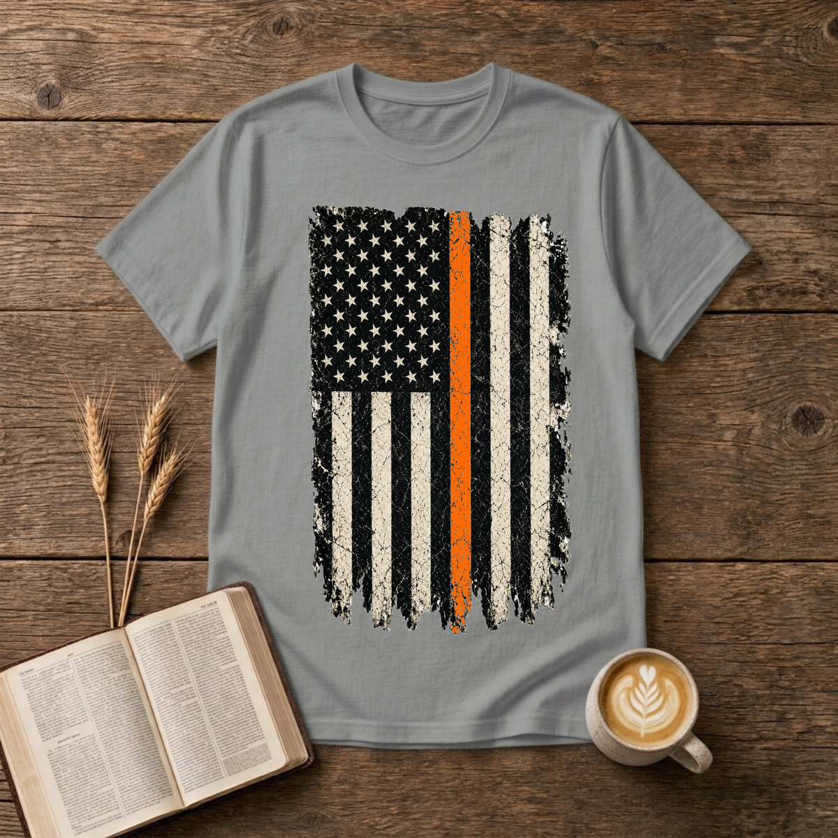 Distressed monochrome American flag with a thin orange line on a Sport Grey unisex T-Shirt