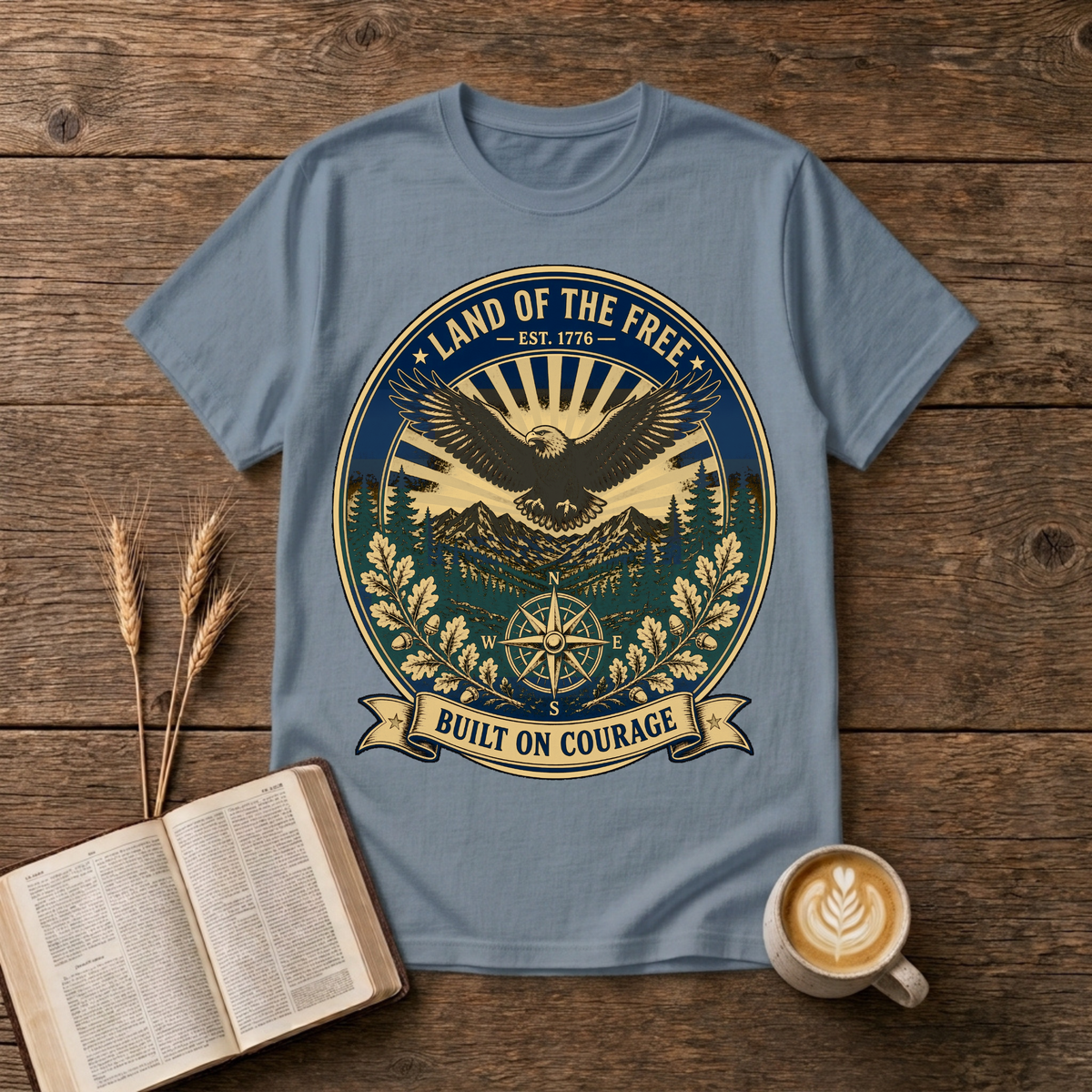 Vintage-style eagle emblem with Land of the Free and patriotic motifs on a Stone Blue unisex T-Shirt