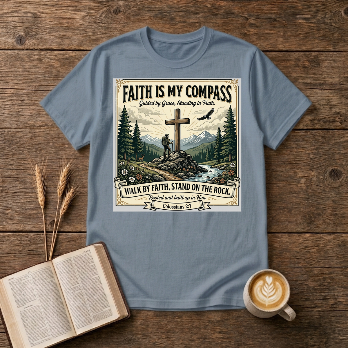 Faith Is My Compass design of a cross among pines with a lone hiker and soaring eagle on a Stone Blue unisex T-Shirt