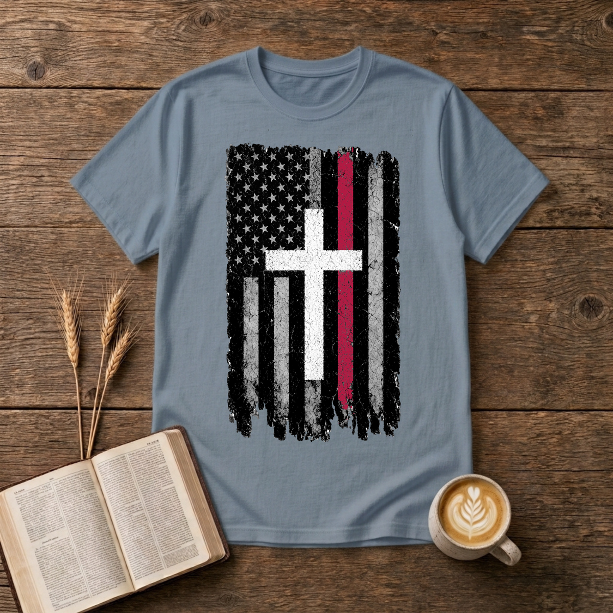 Grayscale American flag with a thin red stripe and cross motif on a Stone Blue unisex T-Shirt