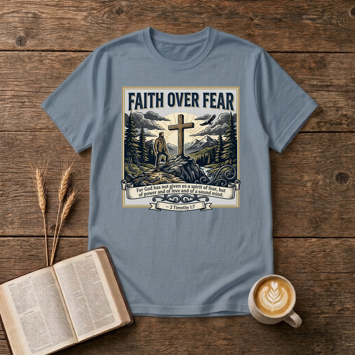 Faith Over Fear sketch of a cross on a rocky ridge with a hiker, pines and mountains on a Stone Blue unisex T-Shirt