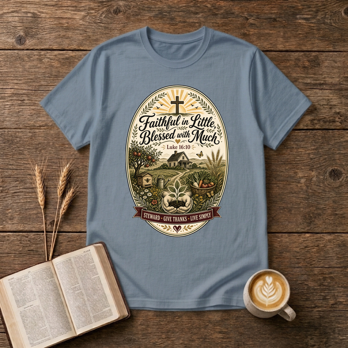 Faithful in Little Blessed with Much design with a small house, hills and cross at sunrise on a Stone Blue unisex T-Shirt