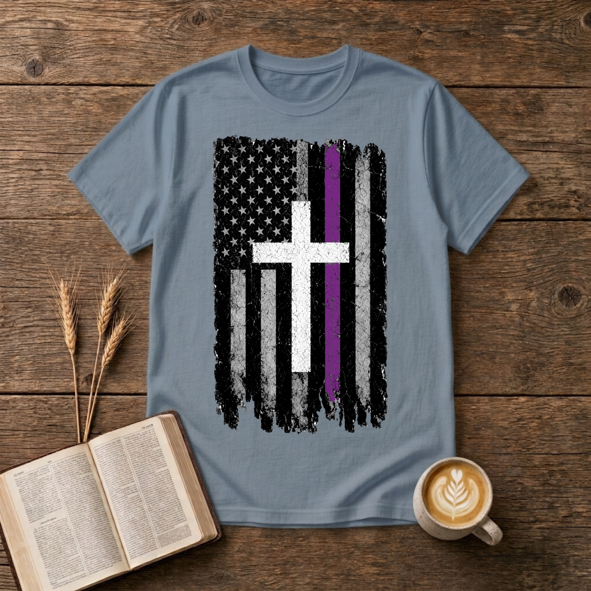 Distressed American flag with a lavender stripe and white cross on a Stone Blue unisex T-Shirt