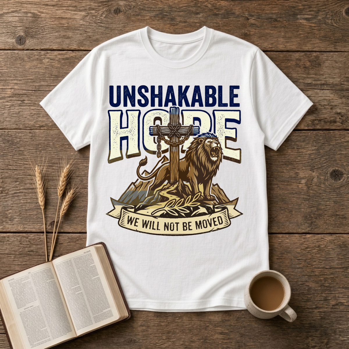 UNSHAKABLE HOPE lettering above a cross and lion illustration on a White unisex T-Shirt