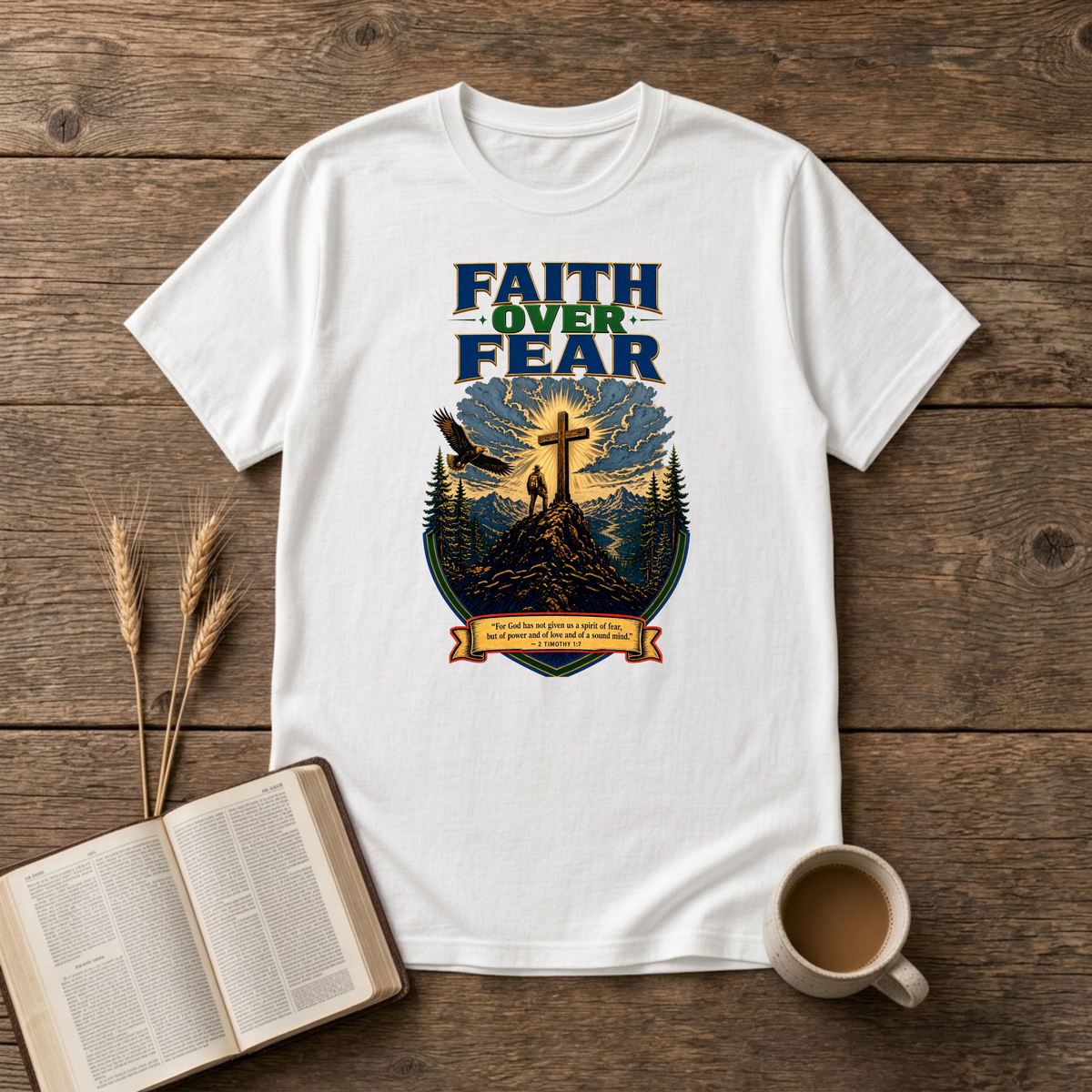 Faith Over Fear lettering over a mountain silhouette, pines and glowing cross on a White unisex T-Shirt
