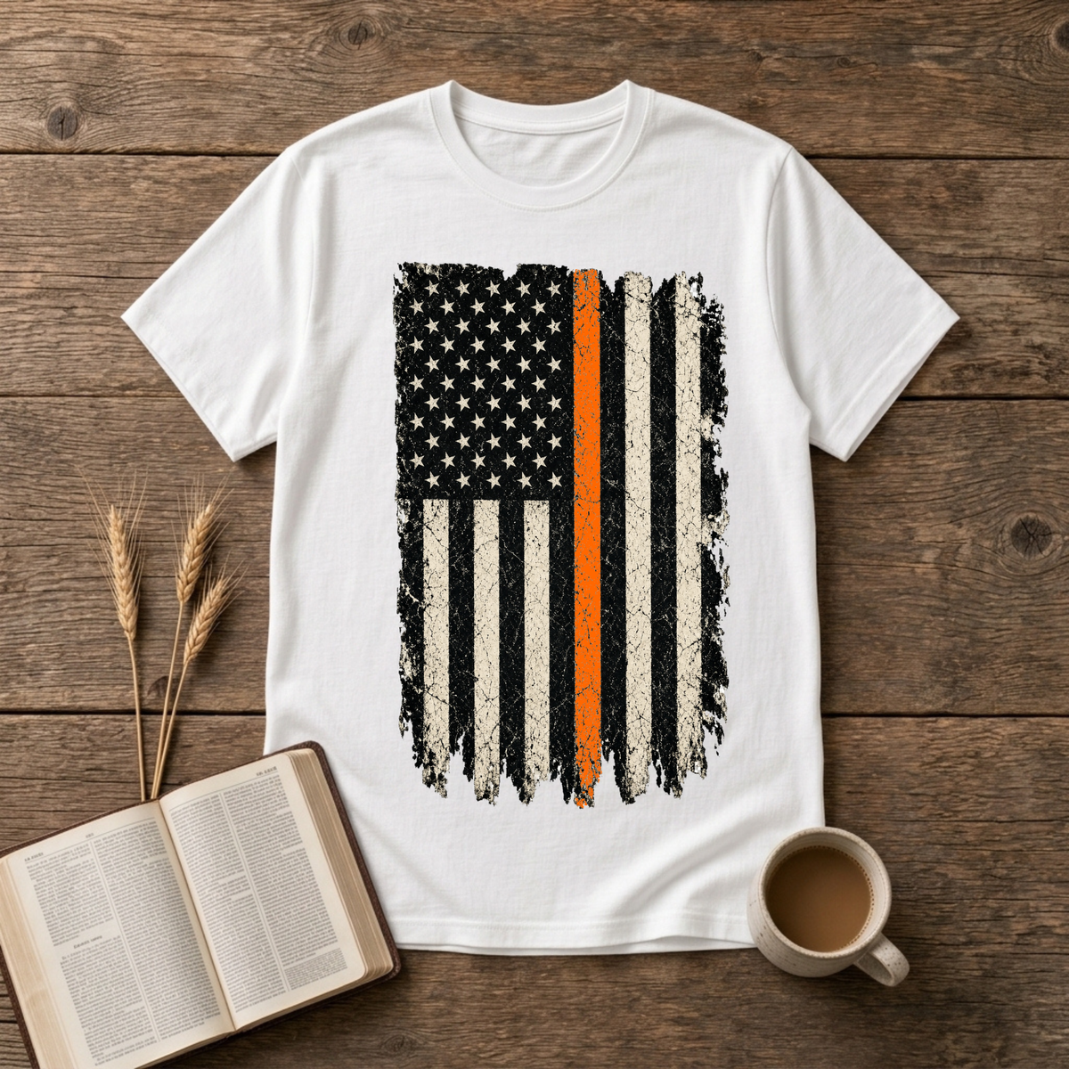 Distressed monochrome American flag with a thin orange line on a White unisex T-Shirt